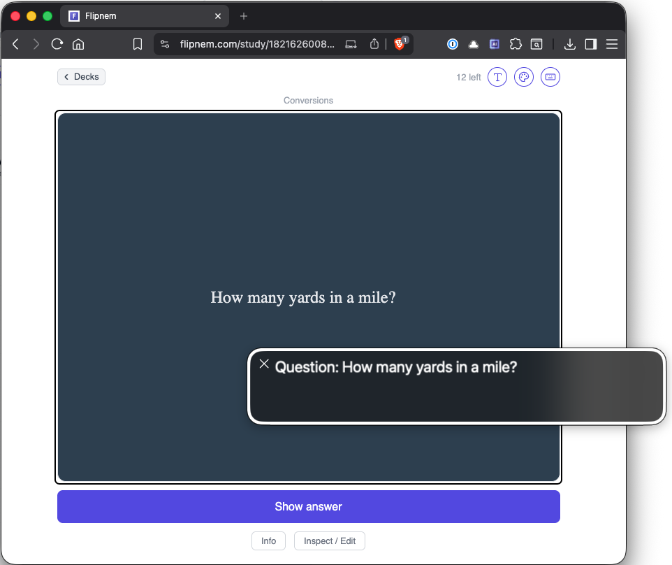 A Flipnem study card reading "How many yards in a mile?" with a live caption bubble announcing the question, as VoiceOver would read it aloud
